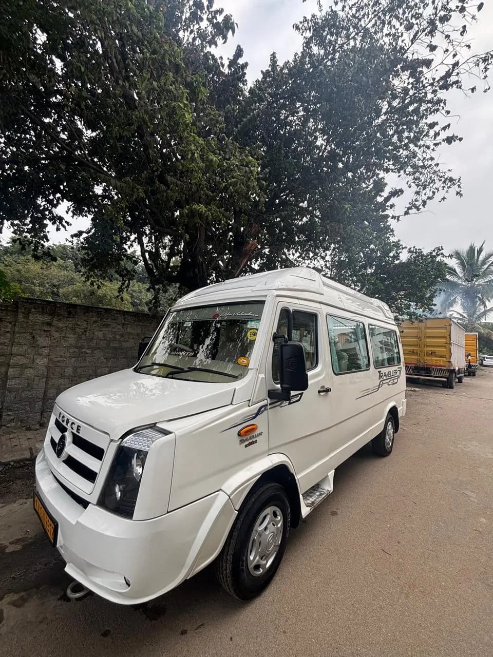 Sushi Travels rental vehicle - 9 Seater Tempo Traveller